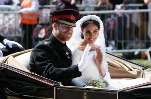 Lip readers reveal what Harry and Meghan actually said in their hilarious wedding carriage ride conversation