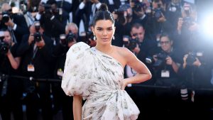 Kendall Jenner has an *interesting* way of cutting a cucumber